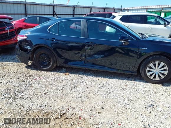 2020 Toyota Camry Hybrid LE z VIN 4T1E31AK9LU019478, wystawiony jako IAAI lot #43097201 z przebiegiem 48 313 mil mil oraz . Historia ofert i sprzedaży dostępna na DreamBid. Obrazek 6.