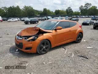 2012 Hyundai Veloster w/Black Int с VIN KMHTC6AD9CU078598, выставлен на аукционе Copart как лот 71725315 с пробегом 132 019 миль миль и Чистый • Clean title. История ставок и продаж доступна на DreamBid. Изображение 1.