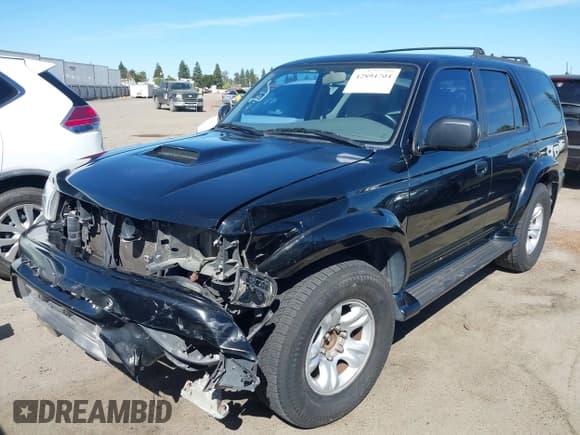 ✅ 2001 Toyota 4Runner SR5 • VIN: JT3GN86R010183457 • Lot: 42894704. Listed on IAAI with 245,541 mi. Free auction sales archive from the USA and detailed vehicle history report at DreamBid. Image 2.