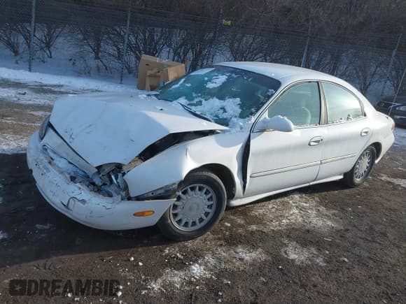 ✅ 1997 Mercury Sable GS • VIN: 1MELM50U6VA657452 • Лот: 41415751. Опубликован ранее на IAAI с пробегом 185 235 миль. Бесплатный доступ к архиву аукционных продаж из США и подробный отчёт об истории автомобиля на DreamBid. Изображение 2.