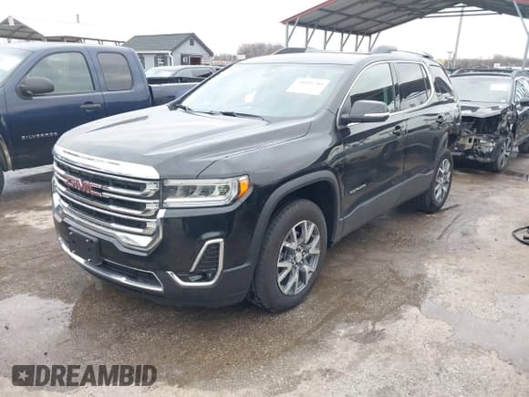 ✅ 2023 GMC Acadia SLT • VIN: 1GKKNML44PZ225872 • Lot: 41091785. Listed on IAAI with 21,334 mi. Free auction sales archive from the USA and detailed vehicle history report at DreamBid. Image 19.