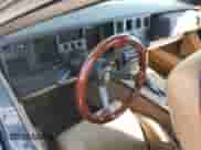 1986 Chevrolet Corvette with VIN 1G1YY0789G5118657, listed as a Copart auction lot 77743794 with 97,673 mi miles and Salvage title. Bid and sale history available at DreamBid. Image 8.