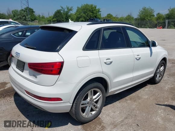 ✅ 2017 Audi Q3 Premium • VIN: WA1BCCFS7HR009192 • Lot: 42734919. Listed on IAAI with 100,100 mi. Free auction sales archive from the USA and detailed vehicle history report at DreamBid. Image 4.