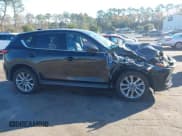 ✅ 2020 Mazda CX-5 Grand Touring • VIN: JM3KFADM9L0766623 • Lot: 43706056. Wystawiony na IAAI z przebiegiem 54 913 mil. Bezpłatny archiwum sprzedaży aukcyjnych z USA i szczegółowy raport historii pojazdu na DreamBid. Zdjęcie 13.