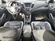 ✅ 2014 Hyundai Veloster Turbo • VIN: KMHTC6AE3EU208323 • Lot: 43638525. Wystawiony na Copart z przebiegiem 187 857 mil. Bezpłatny archiwum sprzedaży aukcyjnych z USA i szczegółowy raport historii pojazdu na DreamBid. Zdjęcie 8.