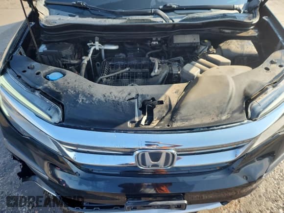 ✅ 2019 Honda Pilot Touring 7-Passenger • VIN: 5FNYF6H69KB092985 • Lot: 69071955. Listed on Copart with 128,915 mi. Free auction sales archive from the USA and detailed vehicle history report at DreamBid. Image 12.