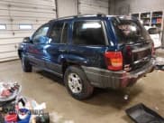 ✅ 2004 Jeep Grand Cherokee Laredo • VIN: 1J4GW48S64C428423 • Lot: 43682900. Listed on IAAI with 242,265 mi. Free auction sales archive from the USA and detailed vehicle history report at DreamBid. Image 3.