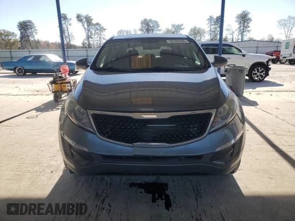 ✅ 2015 Kia Sportage LX • VIN: KNDPB3AC3F7693505 • Lot: 92536285. Listed on Copart with 101,967 mi. Free auction sales archive from the USA and detailed vehicle history report at DreamBid. Image 5.