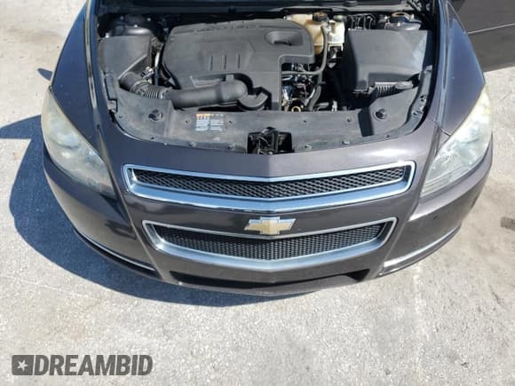 ✅ 2012 Chevrolet Malibu 1LT • VIN: 1G1ZC5E04CF384282 • Lot: 67039585. Listed on Copart with 184,458 mi. Free auction sales archive from the USA and detailed vehicle history report at DreamBid. Image 11.