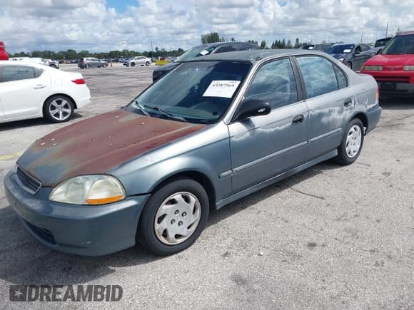 ✅ 1997 Honda Civic LX • VIN: 2HGEJ6676VH504812 • Lot: 43287569. Listed on IAAI with 51,749 mi. Free auction sales archive from the USA and detailed vehicle history report at DreamBid. Image 2.