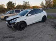 ✅ 2022 Tesla Model Y Long Range • VIN: 7SAYGDEE6NF313110 • Lot: 41703939. Wystawiony na IAAI z przebiegiem 12 468 mil. Bezpłatny archiwum sprzedaży aukcyjnych z USA i szczegółowy raport historii pojazdu na DreamBid. Zdjęcie 22.