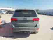 2021 Jeep Grand Cherokee Laredo X z VIN 1C4RJFAG5MC778298, wystawiony jako IAAI lot #43180266 z przebiegiem 59 715 mil mil oraz . Historia ofert i sprzedaży dostępna na DreamBid. Obrazek 17.