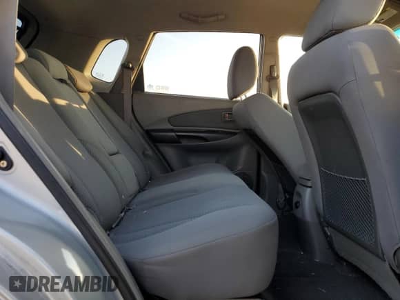 2009 Hyundai Tucson GLS z VIN KM8JM12B29U977896, wystawiony jako Copart lot #81466764 z przebiegiem 168 214 mil mil oraz Szkoda całkowita • Salvage title. Historia ofert i sprzedaży dostępna na DreamBid. Obrazek 11.