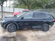 ✅ 2021 Volkswagen Tiguan SE • VIN: 3VV2B7AXXMM058256 • Lot: 43250700. Wystawiony na IAAI z przebiegiem 33 409 mil. Bezpłatny archiwum sprzedaży aukcyjnych z USA i szczegółowy raport historii pojazdu na DreamBid. Zdjęcie 14.