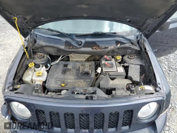 ✅ 2016 Jeep Patriot Latitude • VIN: 1C4NJRFB5GD511142 • Lot: 84433775. Listed on Copart with 115,800 mi. Free auction sales archive from the USA and detailed vehicle history report at DreamBid. Image 12.