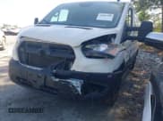 ✅ 2021 Ford Transit Cargo • VIN: 1FTBR1Y88MKA76509 • Lot: 42005100. Listed on IAAI with 34,029 mi. Free auction sales archive from the USA and detailed vehicle history report at DreamBid. Image 6.