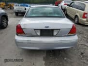 ✅ 2000 Ford Crown Victoria • VIN: 2FAFP73W6YX117101 • Lot: 66004304. Wystawiony na Copart z przebiegiem 124 011 mil. Bezpłatny archiwum sprzedaży aukcyjnych z USA i szczegółowy raport historii pojazdu na DreamBid. Zdjęcie 6.