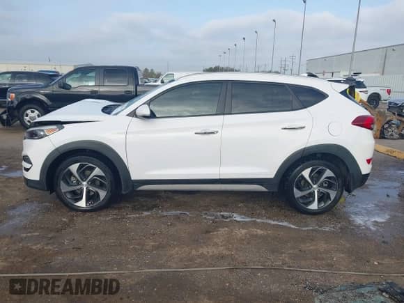 2018 Hyundai Tucson Limited with VIN KM8J33A22JU677697, listed as a IAAI auction lot 41780870 with 93,992 mi miles and . Bid and sale history available at DreamBid. Image 14.