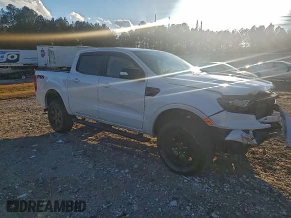✅ 2020 Ford Ranger Lariat • VIN: 1FTER4FH7LLA16800 • Lot: 94182395. Wystawiony na Copart z przebiegiem 106 047 mil. Bezpłatny archiwum sprzedaży aukcyjnych z USA i szczegółowy raport historii pojazdu na DreamBid. Zdjęcie 4.