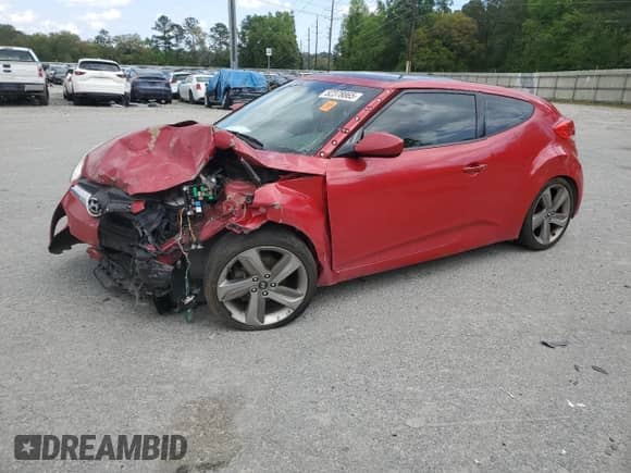 2013 Hyundai Veloster w/Gray Int z VIN KMHTC6AD8DU104366, wystawiony jako Copart lot #52378865 z przebiegiem Nie podano mil oraz Szkoda całkowita • Salvage title. Historia ofert i sprzedaży dostępna na DreamBid. Obrazek 1.