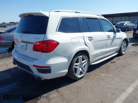 ✅ 2013 Mercedes-Benz GL 550 • VIN: 4JGDF7DE8DA239936 • Lot: 42703205. Listed on IAAI with 149,286 mi. Free auction sales archive from the USA and detailed vehicle history report at DreamBid. Image 4.