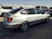 2002 Hyundai Elantra GT z VIN KMHDN55DX2U069068, wystawiony jako Copart lot #73525214 z przebiegiem 195 048 mil mil oraz Szkoda całkowita • Salvage title. Historia ofert i sprzedaży dostępna na DreamBid. Obrazek 3.