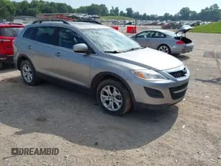 ✅ 2011 Mazda CX-9 Touring • VIN: JM3TB2CA6B0310400 • Lot: 42830851. Listed on IAAI with 163,552 mi. Free auction sales archive from the USA and detailed vehicle history report at DreamBid. Image 1.