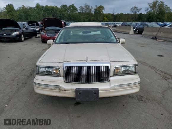 ✅ 1997 Lincoln Town Car Cartier • VIN: 1LNLM83W6VY755884 • Lot: 83774245. Listed on Copart with Not provided. Free auction sales archive from the USA and detailed vehicle history report at DreamBid. Image 5.