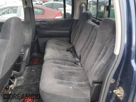 2002 Dodge Dakota SLT z VIN 1B7HG48N42S711374, wystawiony jako Copart lot #68991894 z przebiegiem Nie podano mil oraz Czysty tytuł • Clean title. Historia ofert i sprzedaży dostępna na DreamBid. Obrazek 10.