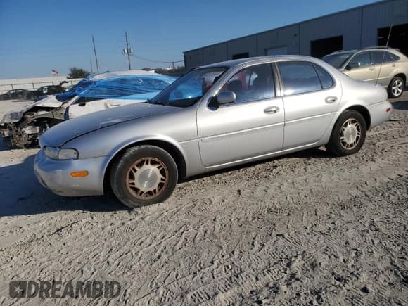 ✅ 1994 Infiniti J30 Personal Luxury • VIN: JNKAY21D6RM113997 • Лот: 82273944. Опубликован ранее на Copart с пробегом 136 089 миль. Бесплатный доступ к архиву аукционных продаж из США и подробный отчёт об истории автомобиля на DreamBid. Изображение 1.