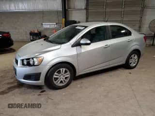 2012 Chevrolet Sonic LS with VIN 1G1JA5SHXC4152634, listed as a Copart auction lot 70631965 with 143,934 mi miles and Salvage title. Bid and sale history available at DreamBid. Image 1.