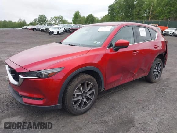 ✅ 2017 Mazda CX-5 Grand Touring • VIN: JM3KFBDL0H0211533 • Lot: 42295157. Listed on IAAI with 79,024 mi. Free auction sales archive from the USA and detailed vehicle history report at DreamBid. Image 2.