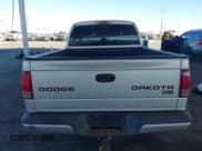 ✅ 2003 Dodge Dakota SLT • VIN: 1D7HL48N13S294573 • Lot: 41291127. Wystawiony na IAAI z przebiegiem 227 355 mil. Bezpłatny archiwum sprzedaży aukcyjnych z USA i szczegółowy raport historii pojazdu na DreamBid. Zdjęcie 16.