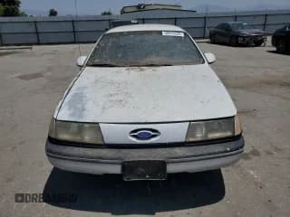 ✅ 1989 Ford Taurus GL • VIN: 1FABP52UXKG244224 • Лот: 59239225. Опубликован ранее на Copart с пробегом 30 853 миль. Бесплатный доступ к архиву аукционных продаж из США и подробный отчёт об истории автомобиля на DreamBid. Изображение 5.