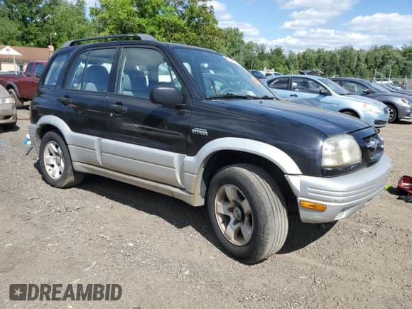 ✅ 1999 Suzuki Grand Vitara JLX • VIN: JS3TD62VXX4100236 • Лот: 57228075. Опубликован ранее на Copart с пробегом Не указан. Бесплатный доступ к архиву аукционных продаж из США и подробный отчёт об истории автомобиля на DreamBid. Изображение 4.