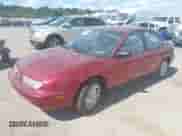 1998 Saturn SL z VIN 1G8ZK5277WZ156690, wystawiony jako IAAI lot #43106078 z przebiegiem 168 196 mil mil oraz . Historia ofert i sprzedaży dostępna na DreamBid. Obrazek 2.