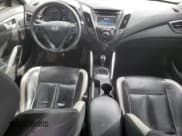 ✅ 2014 Hyundai Veloster Turbo • VIN: KMHTC6AE1EU196690 • Lot: 75475714. Wystawiony na Copart z przebiegiem 231 970 mil. Bezpłatny archiwum sprzedaży aukcyjnych z USA i szczegółowy raport historii pojazdu na DreamBid. Zdjęcie 8.