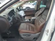 ✅ 2013 Volkswagen Touareg Lux • VIN: WVGEF9BP4DD013167 • Lot: 60422255. Listed on Copart with 157,319 mi. Free auction sales archive from the USA and detailed vehicle history report at DreamBid. Image 7.