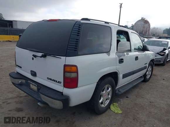 ✅ 2003 Chevrolet Tahoe LS • VIN: 1GNEC13V13J136900 • Lot: 43886921. Listed on IAAI with 226,098 mi. Free auction sales archive from the USA and detailed vehicle history report at DreamBid. Image 4.