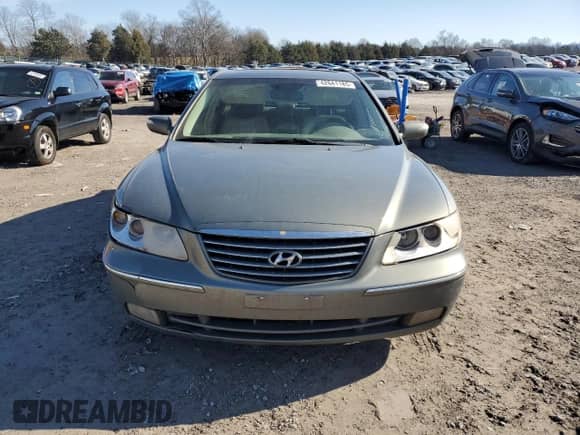 2007 Hyundai Azera SE с VIN KMHFC46F97A160009, выставлен на аукционе Copart как лот 42641185 с пробегом 265 055 миль миль и Чистый • Clean title. История ставок и продаж доступна на DreamBid. Изображение 5.