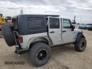 ✅ 2011 Jeep Wrangler Unlimited Rubicon • VIN: 1J4BA6H13BL537964 • Лот: 57532725. Опубликован ранее на Copart с пробегом 71 498 миль. Бесплатный доступ к архиву аукционных продаж из США и подробный отчёт об истории автомобиля на DreamBid. Изображение 3.
