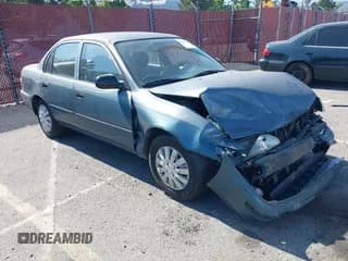 ✅ 1996 Toyota Corolla • VIN: 1NXBA02E0TZ445846 • Lot: 42303514. Listed on IAAI with 155,812 mi. Free auction sales archive from the USA and detailed vehicle history report at DreamBid. Image 1.