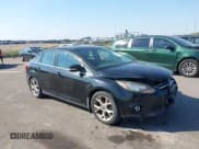 ✅ 2014 Ford Focus Titanium • VIN: 1FADP3J23EL237429 • Lot: 43358765. Listed on IAAI with 138,960 mi. Free auction sales archive from the USA and detailed vehicle history report at DreamBid. Image 1.