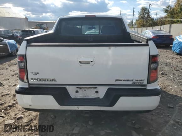 ✅ 2013 Honda Ridgeline Sport • VIN: 5FPYK1F79DB017613 • Лот: 90064275. Опубликован ранее на Copart с пробегом 98 823 миль. Бесплатный доступ к архиву аукционных продаж из США и подробный отчёт об истории автомобиля на DreamBid. Изображение 6.