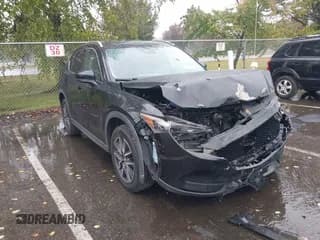 ✅ 2018 Mazda CX-5 Touring • VIN: JM3KFBCM3J0437436 • Lot: 43436406. Listed on IAAI with 122,774 mi. Free auction sales archive from the USA and detailed vehicle history report at DreamBid. Image 1.