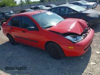 ✅ 2000 Ford Focus LX • VIN: 1FAFP33PXYW413249 • Lot: 42561661. Listed on IAAI with 253,875 mi. Free auction sales archive from the USA and detailed vehicle history report at DreamBid. Image 1.