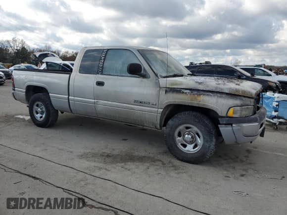 1999 Dodge 1500 с VIN 3B7HC13Y5XG212559, выставлен на аукционе Copart как лот 81298064 с пробегом Не указан миль и Списание • Salvage title. История ставок и продаж доступна на DreamBid. Изображение 4.