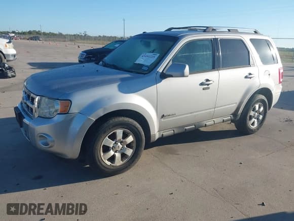 ✅ 2009 Ford Escape Hybrid • VIN: 1FMCU49369KA52087 • Lot: 43491225. Listed on IAAI with 208,540 mi. Free auction sales archive from the USA and detailed vehicle history report at DreamBid. Image 2.