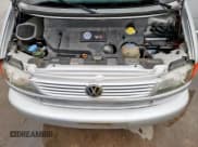 ✅ 2002 Volkswagen EuroVan GLS • VIN: WV2KB47042H008513 • Lot: 83827755. Listed on Copart with 218,272 mi. Free auction sales archive from the USA and detailed vehicle history report at DreamBid. Image 12.