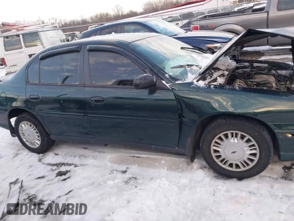 2003 Chevrolet Malibu z VIN 1G1ND52JX3M566217, wystawiony jako IAAI lot #41251951 z przebiegiem 94 727 mil mil oraz . Historia ofert i sprzedaży dostępna na DreamBid. Obrazek 13.